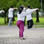 Chinese citizens practicing Tai Chi in the park