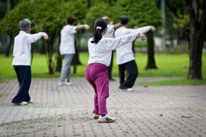 Chinese citizens practicing Tai Chi in the park