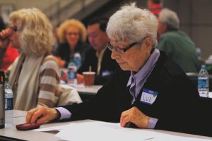 Patient studying at patient forum