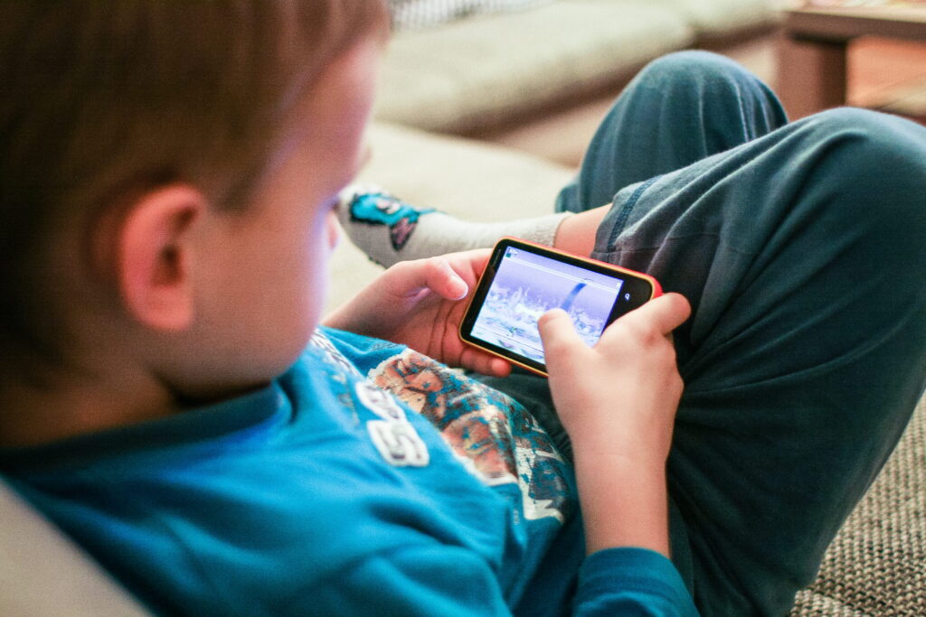 Child playing on a smartphone