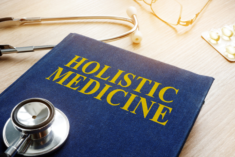  What distinguishes functional medicine from holistic medicine?