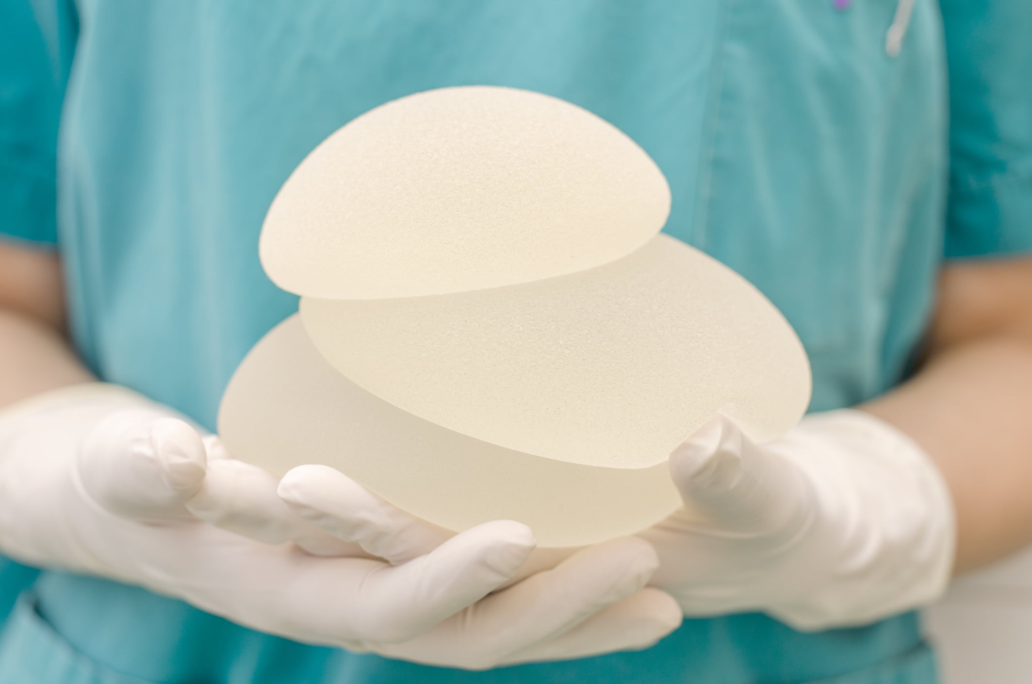 get the benefits of a breast implant surgery