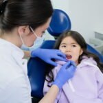 Make Cleaning Your Kid's Teeth Easier With These Tips