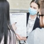 a woman explaining the document