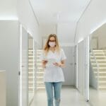 a woman walking on the hallway