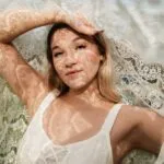 sunlit portrait with delicate lace shadows