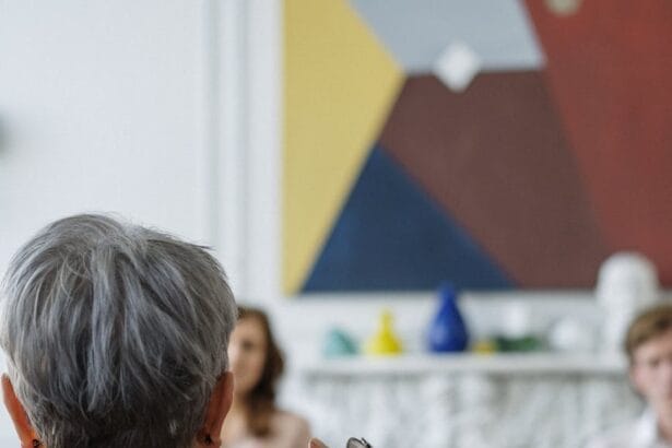 man in black suit jacket using smartphone