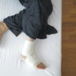 man with bandage on foot