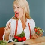 woman eating a salad