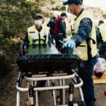 emergency medical simulation with rescue team outdoors