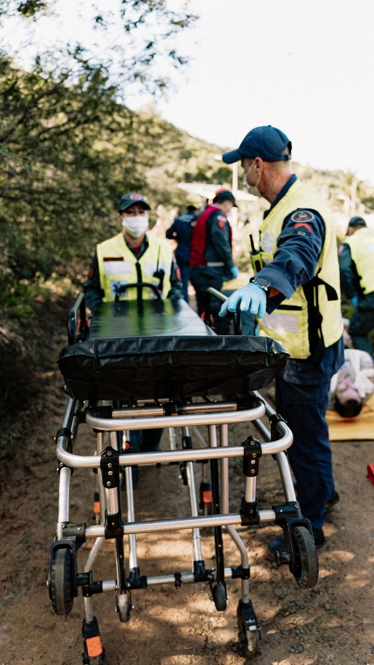 emergency medical simulation with rescue team outdoors